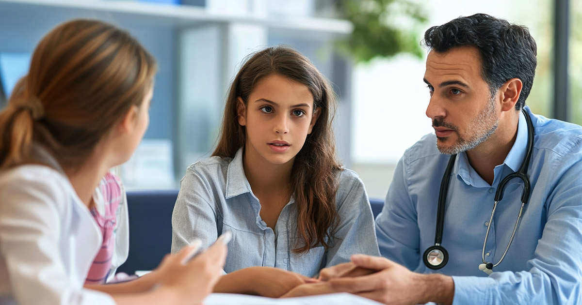 A concerned family meeting with a hospital financial counselor