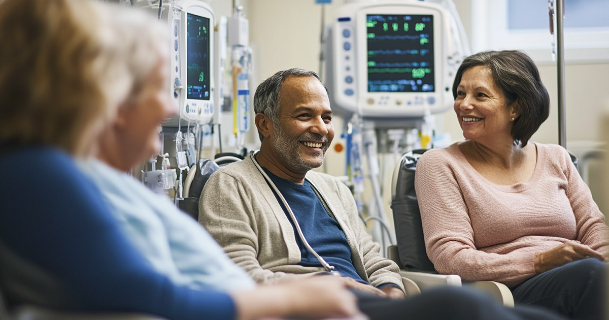 Diverse group of dialysis patients chatting softly in a treatment room, IV machines in background