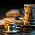 Stethoscope and money representing the trump Medicaid cuts impact on healthcare funding