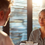 Doctor discussing treatment funding options with a patient